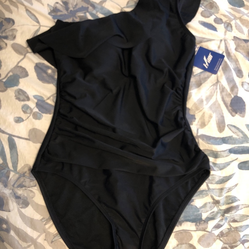 One arm ruffled one piece bathing suit size M.